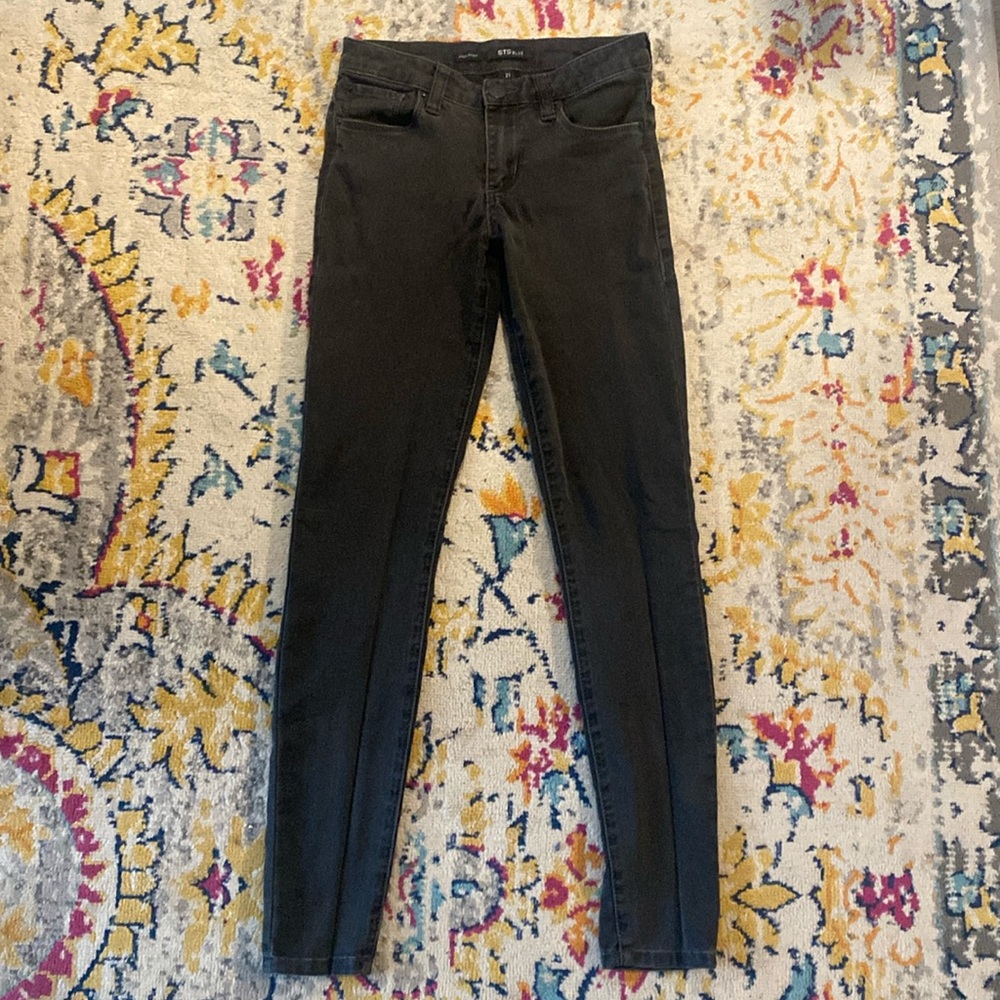 Grey stretchy mid rise skinny jeans